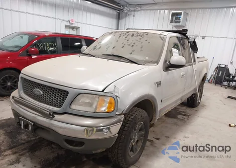 2002 Ford F-150 Lariat/Xlt z USA, uszkodzony, nr VIN 1FTRW08L12KB70492